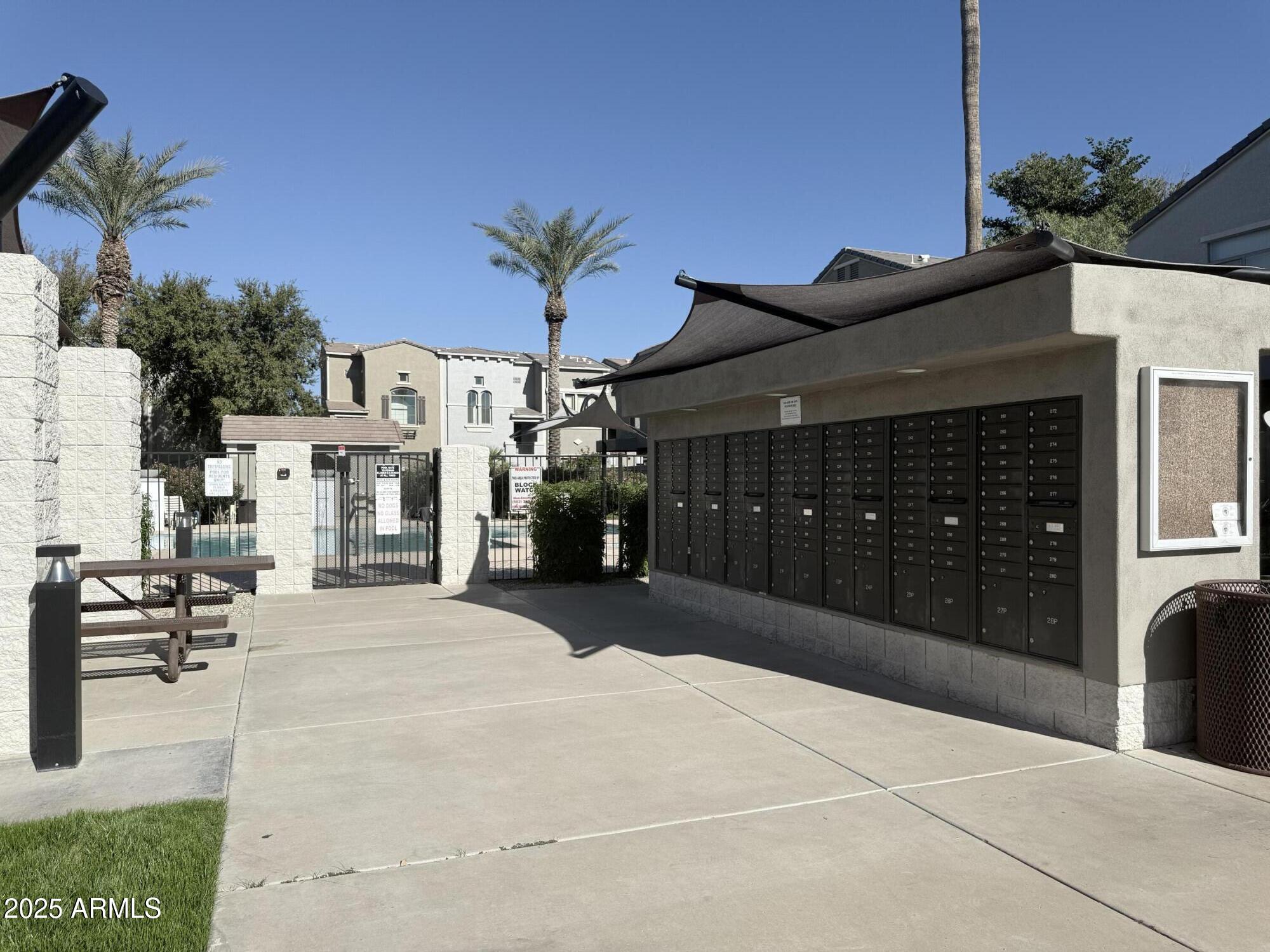 2150 West Alameda Road, Unit 1032 Phoenix, AZ 85085 - Photo 36 of 39 a building outdoor space with patio furniture and a potted plants