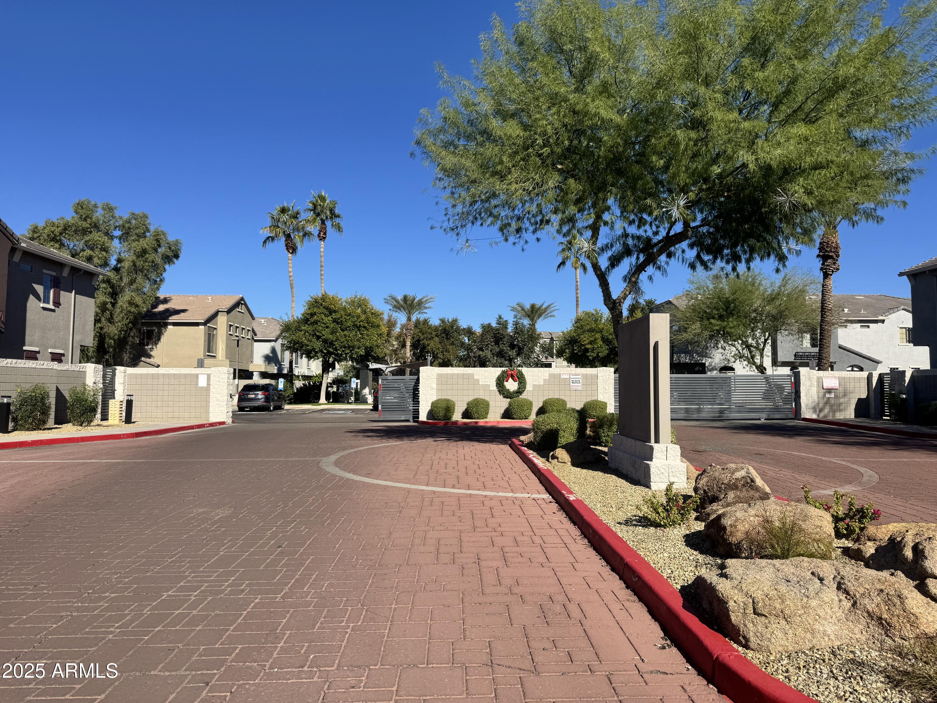 2150 West Alameda Road, Unit 1032 Phoenix, AZ 85085 - Photo 38 of 39 a view of a street with a cars on the road