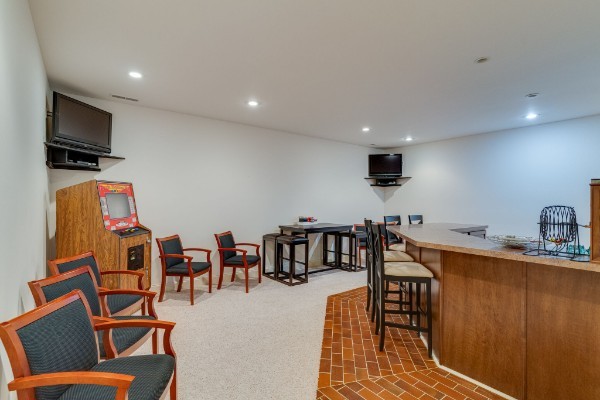 4664 New Cut Road Greenbrier, TN 37073 - Photo 38 of 85 a dining room with furniture and a flat screen tv
