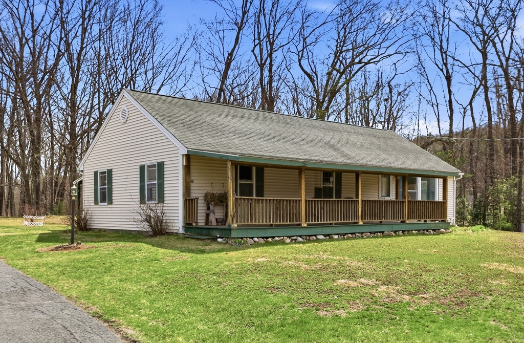 240 Upper Road Deerfield, MA 01342 - Photo 3 of 42 front view of a house with a yard