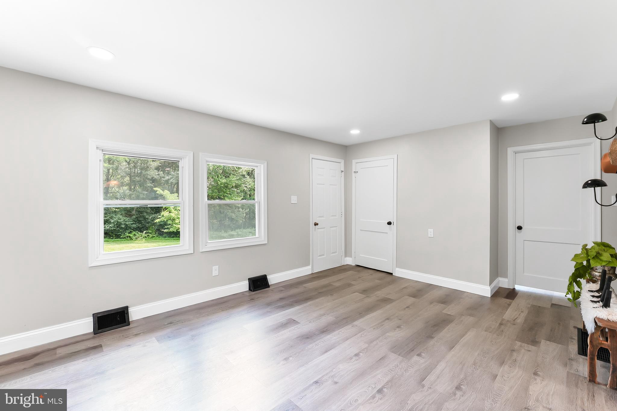 250 Red Pump Road Nottingham, PA 19362 - Photo 12 of 29 wooden floor in an empty room with a window