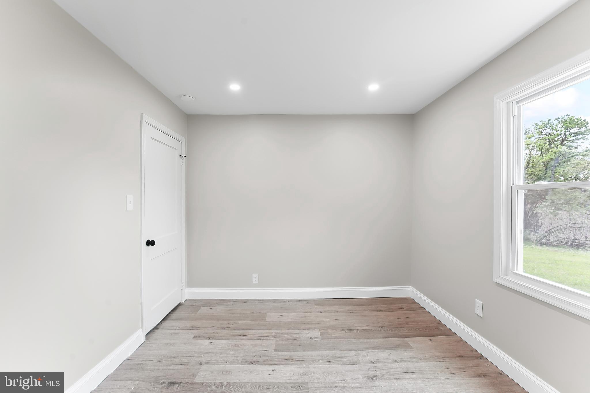 250 Red Pump Road Nottingham, PA 19362 - Photo 22 of 29 a view of room with window and hardwood floor
