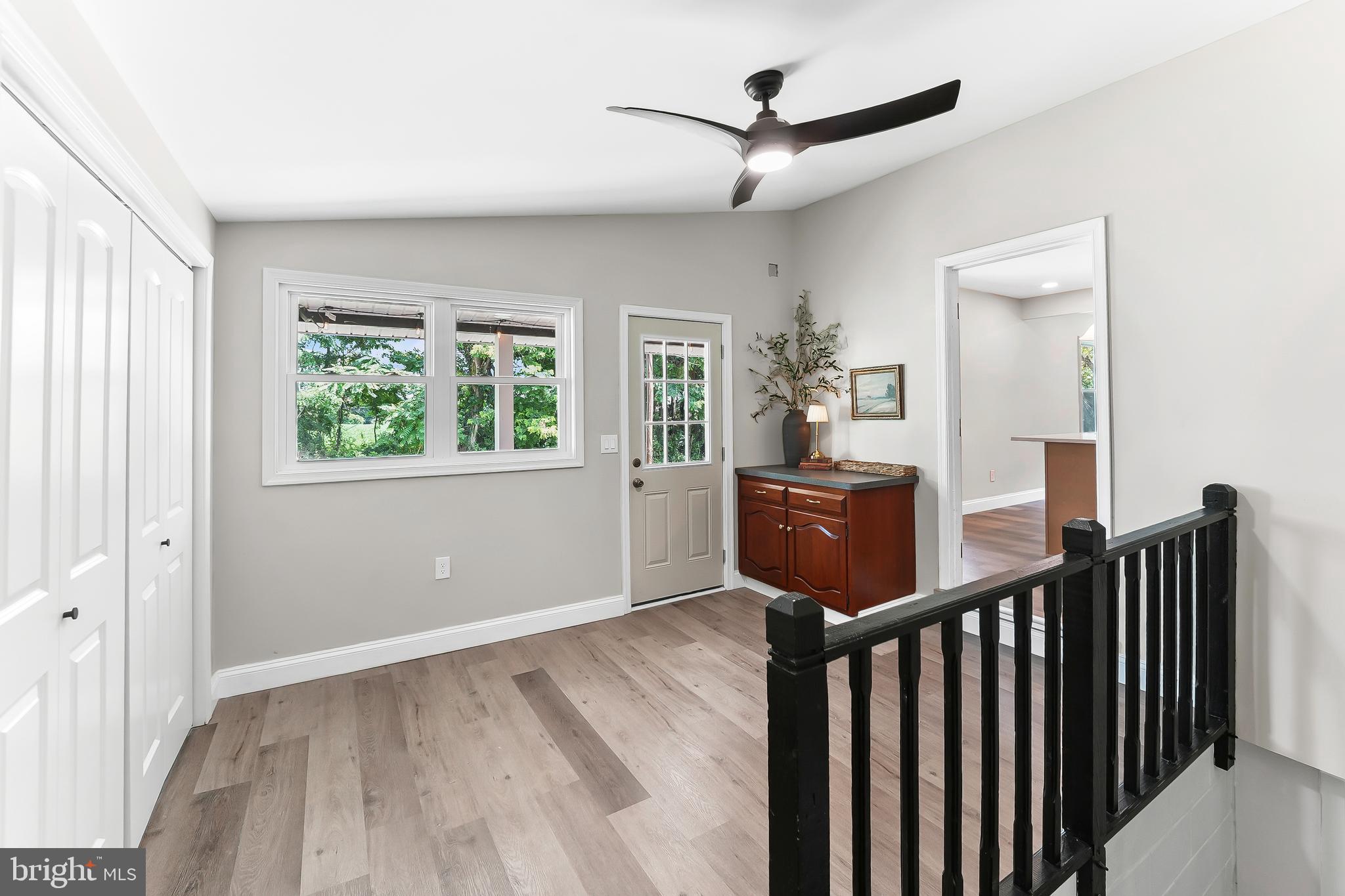 250 Red Pump Road Nottingham, PA 19362 - Photo 25 of 29 a view of a hallway with wooden floor and staircase