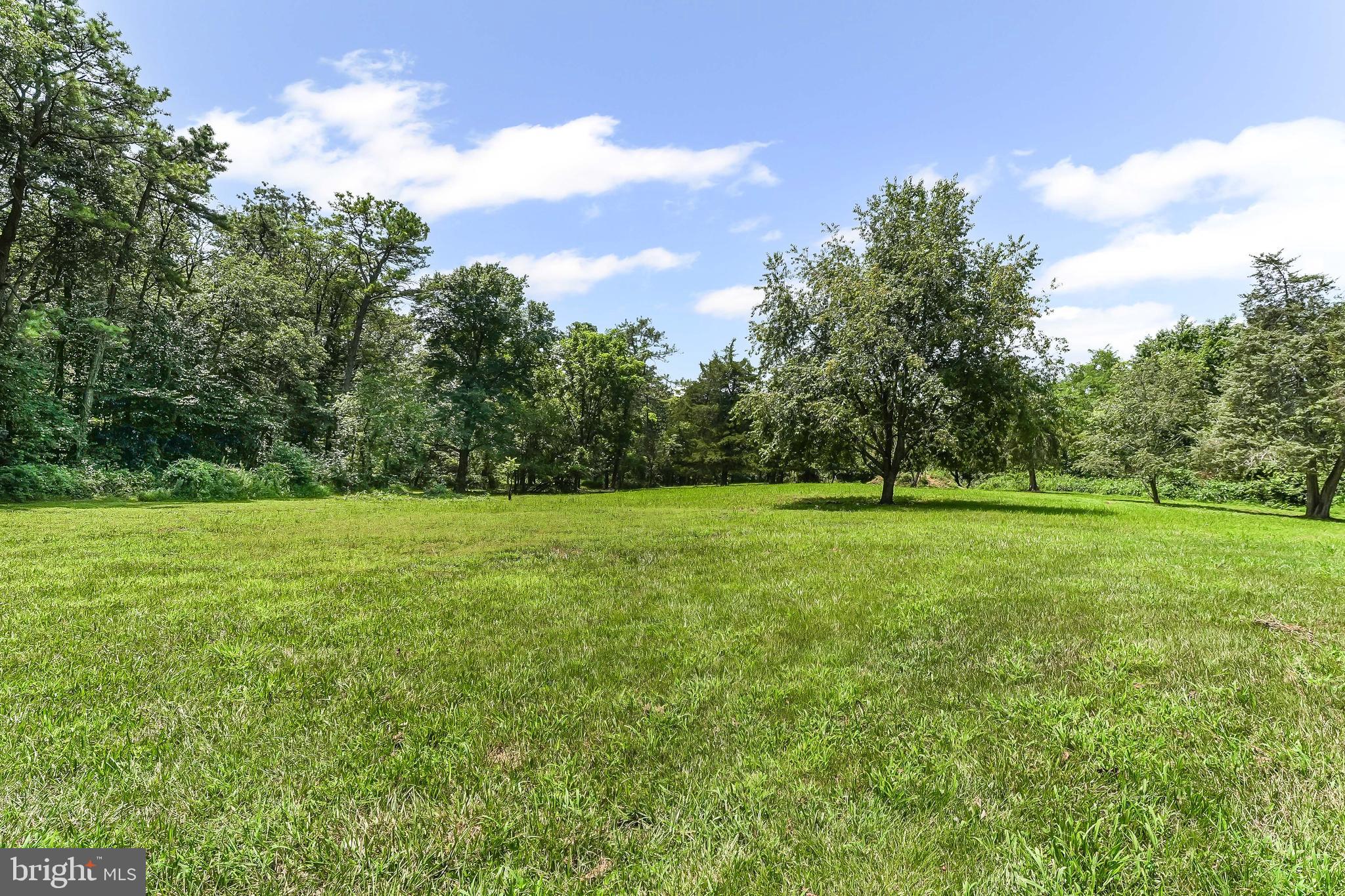 250 Red Pump Road Nottingham, PA 19362 - Photo 28 of 29 a view of a green field with wooden fence
