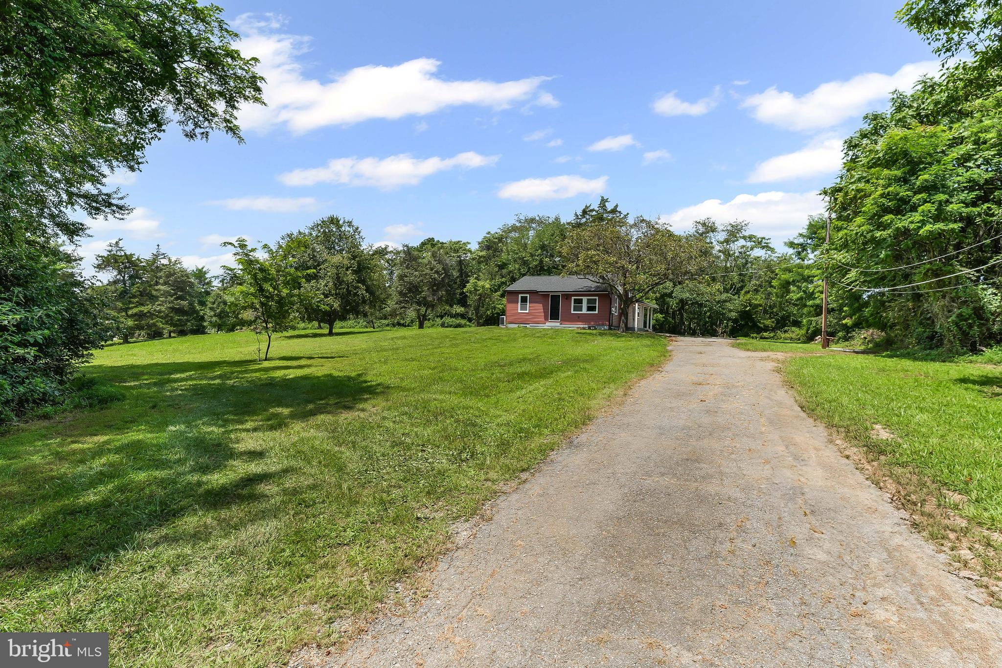 250 Red Pump Road Nottingham, PA 19362 - Photo 3 of 29 a view of a garden with an trees