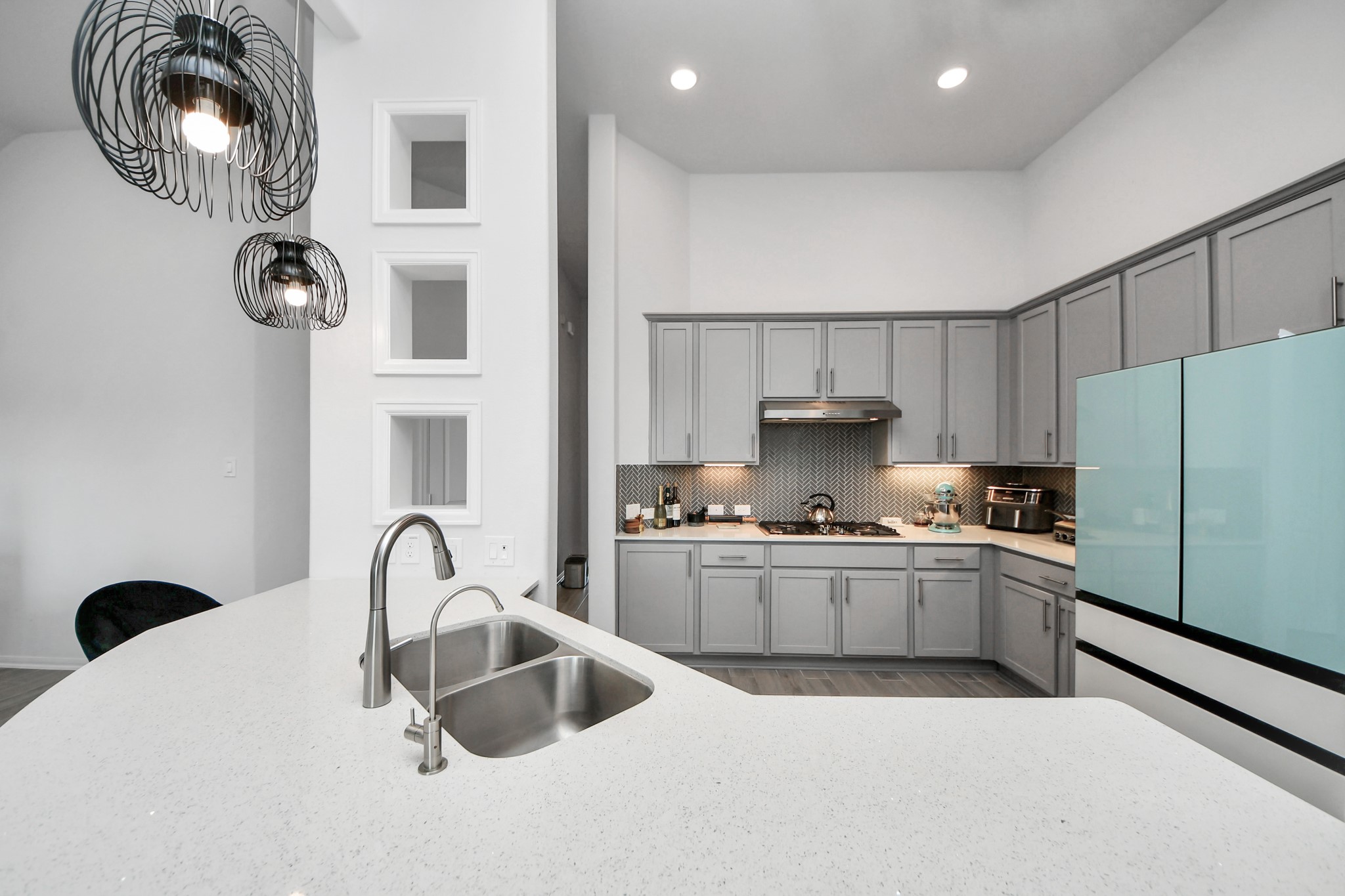 1614 Sequoia Run Drive Rosharon, TX 77583 - Photo 17 of 45 a kitchen with stainless steel appliances granite countertop a sink and a stove