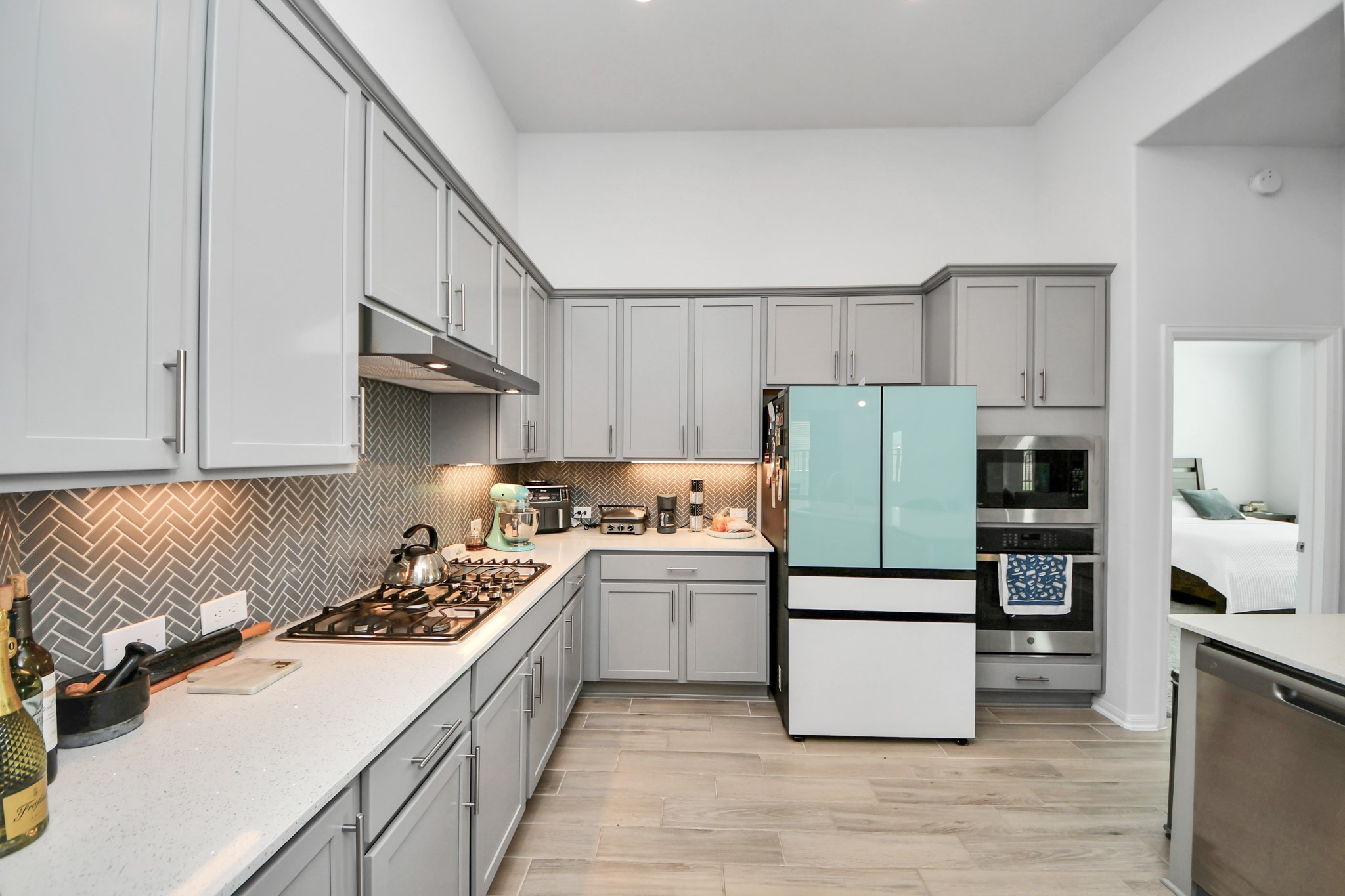 1614 Sequoia Run Drive Rosharon, TX 77583 - Photo 19 of 45 a kitchen with a cabinets and steel stainless steel appliances