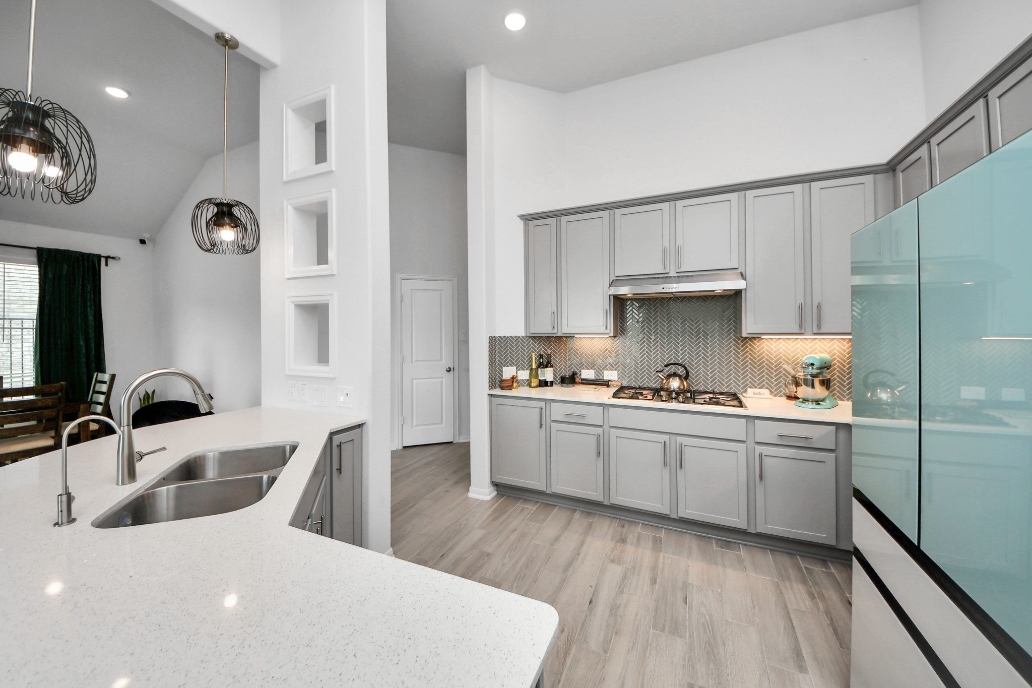 1614 Sequoia Run Drive Rosharon, TX 77583 - Photo 20 of 45 a kitchen with kitchen island granite countertop a sink cabinets and stainless steel appliances