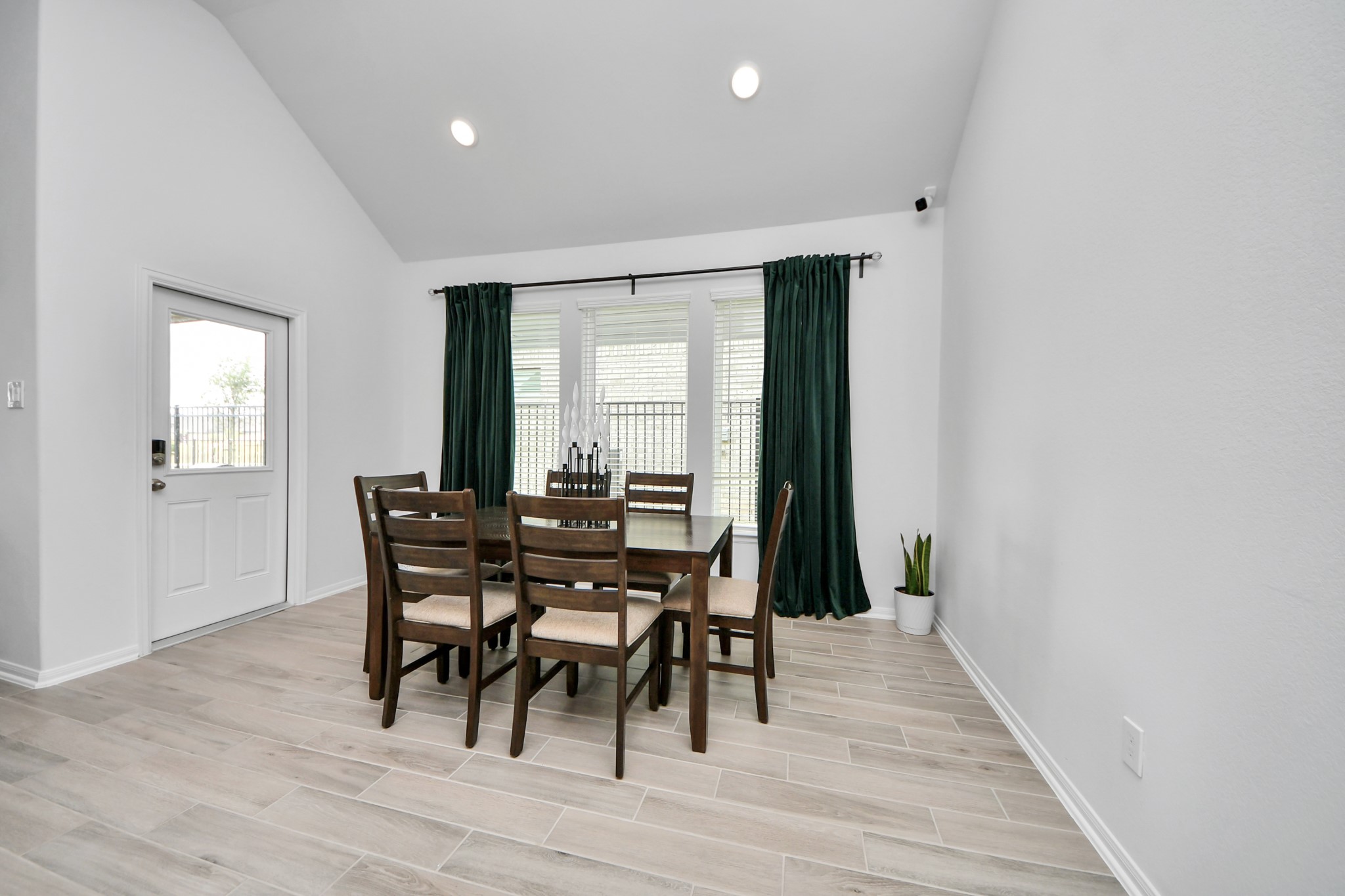 1614 Sequoia Run Drive Rosharon, TX 77583 - Photo 23 of 45 a dining room with furniture and wooden floor