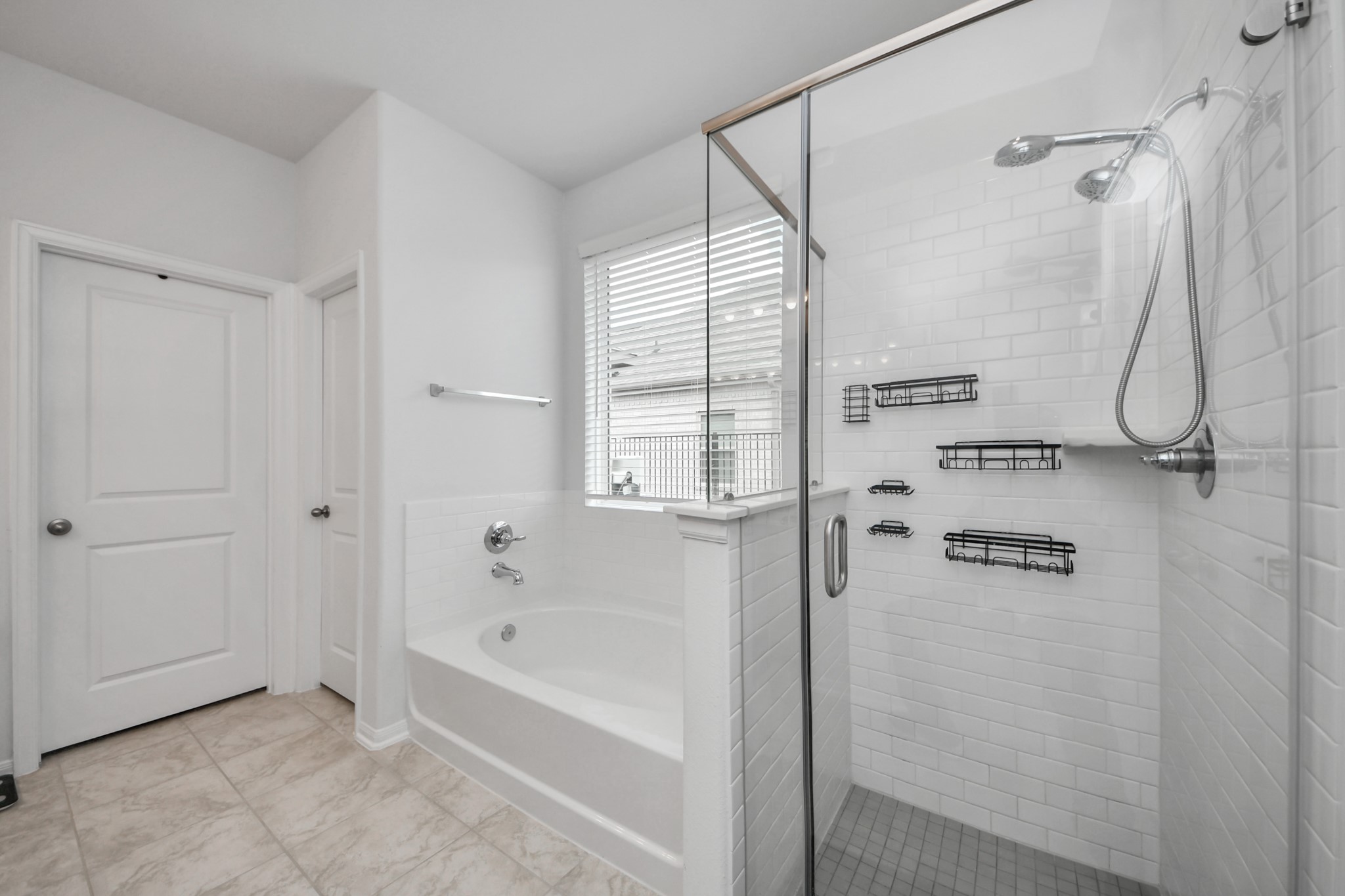 1614 Sequoia Run Drive Rosharon, TX 77583 - Photo 26 of 45 a bathroom with a bathtub and shower