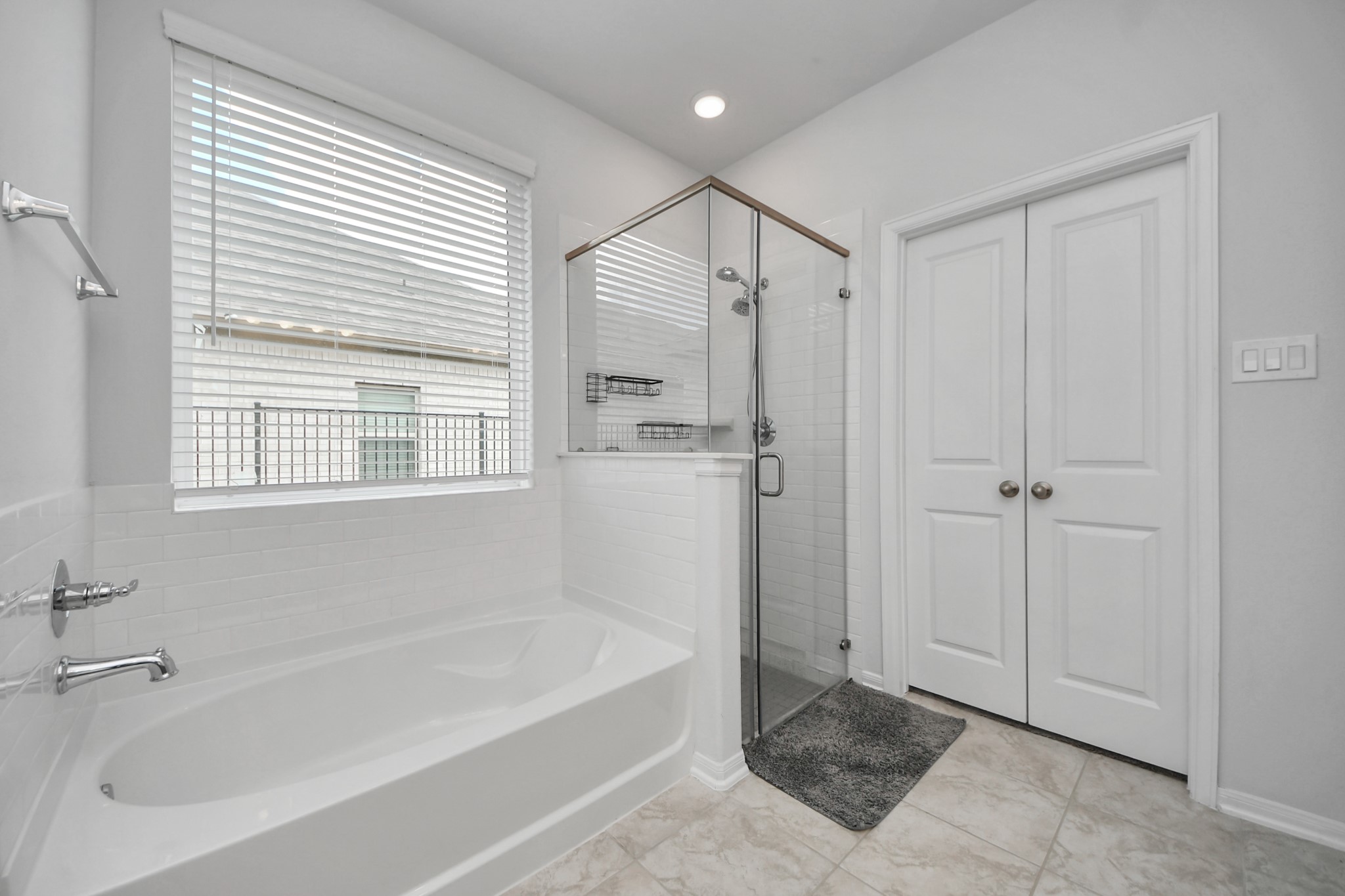1614 Sequoia Run Drive Rosharon, TX 77583 - Photo 28 of 45 a bathroom with a bathtub and a shower