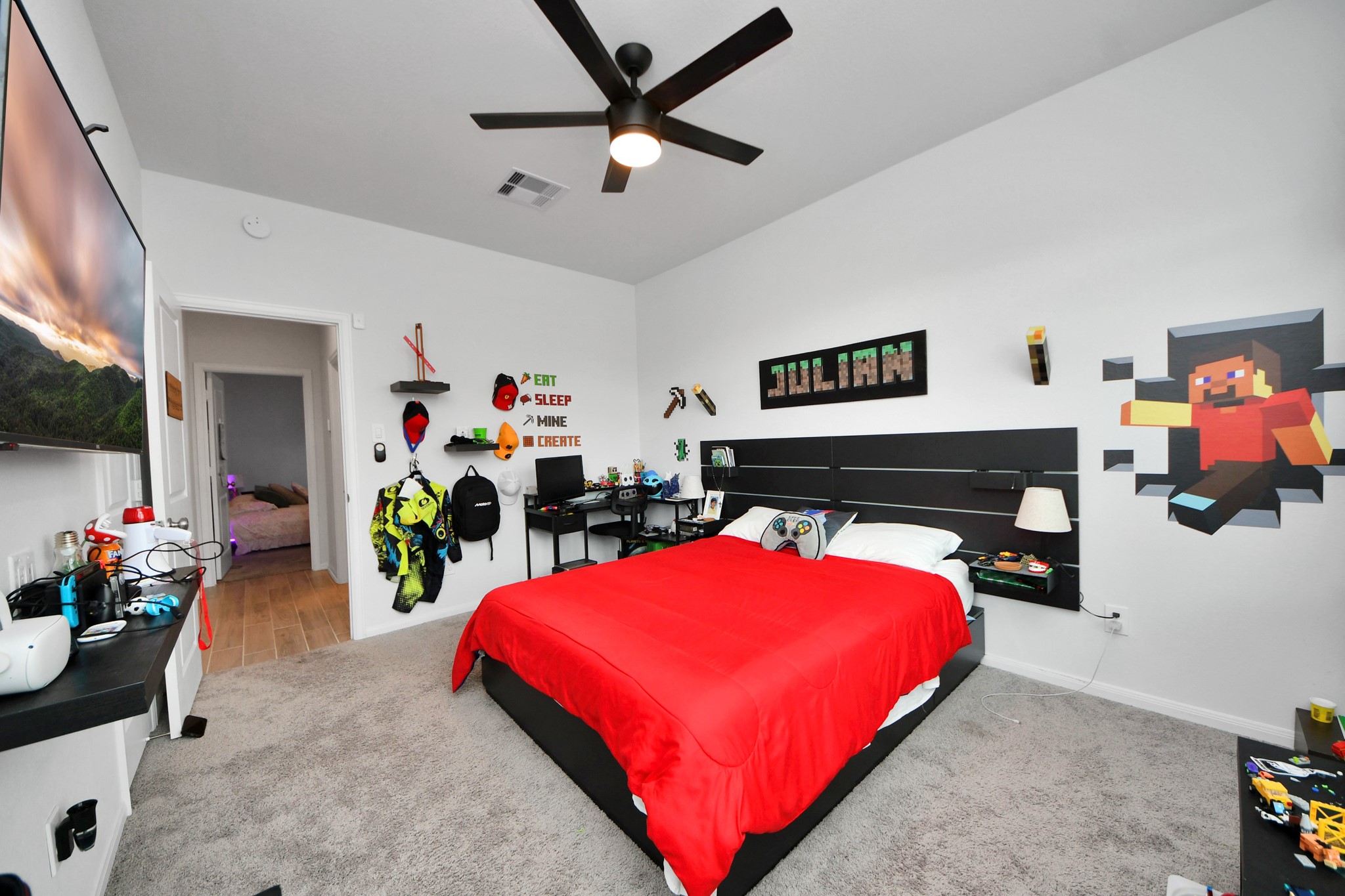 1614 Sequoia Run Drive Rosharon, TX 77583 - Photo 37 of 45 a bed room with a bed and a desk