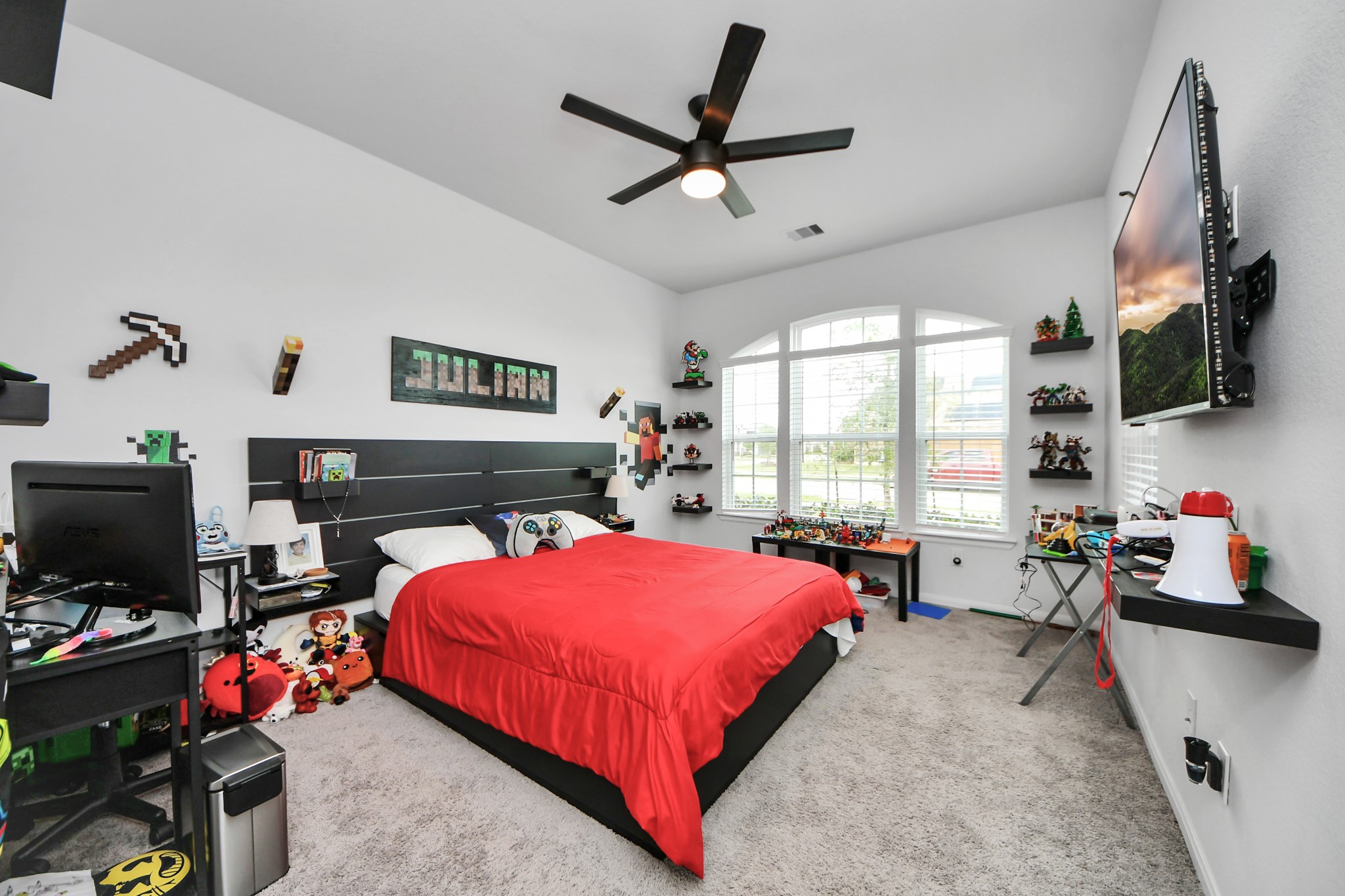 1614 Sequoia Run Drive Rosharon, TX 77583 - Photo 38 of 45 a bed room with a bed tv and a window