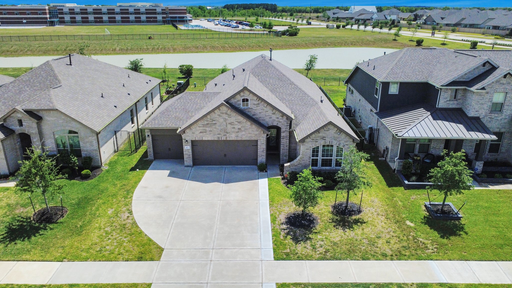 1614 Sequoia Run Drive Rosharon, TX 77583 - Photo 4 of 45 a aerial view of a house with a big yard plants and large trees