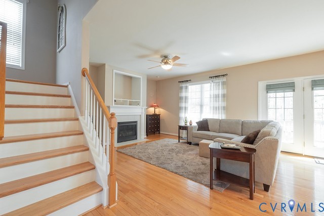 11625 Explorer Drive Midlothian, VA 23114 - Photo 12 of 56 Side stairs with fam rm