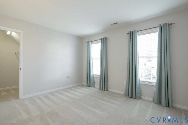 11625 Explorer Drive Midlothian, VA 23114 - Photo 18 of 56 Front bedroom with walk-in closet