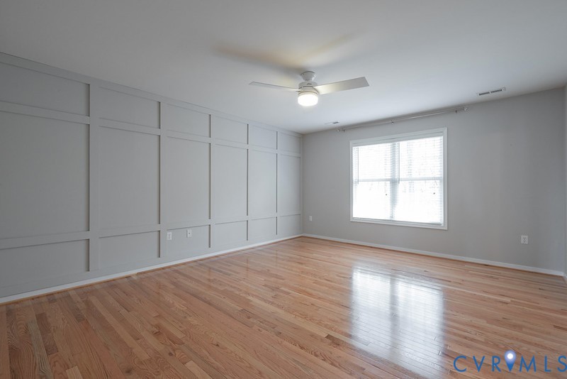 11625 Explorer Drive Midlothian, VA 23114 - Photo 8 of 56 Decorative wall and Hardwood Floors