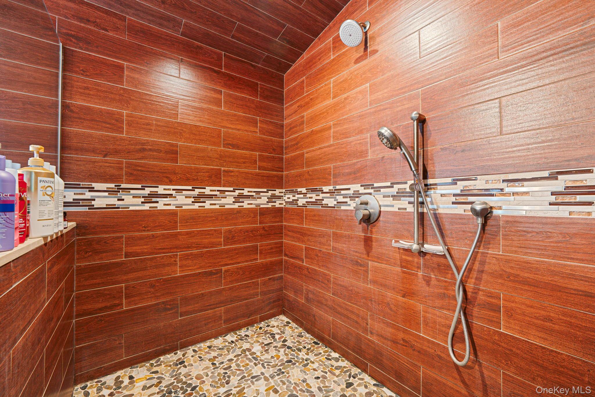 183 Old Country Road Speonk, NY 11972 - Photo 16 of 48 Full bathroom featuring tiled shower