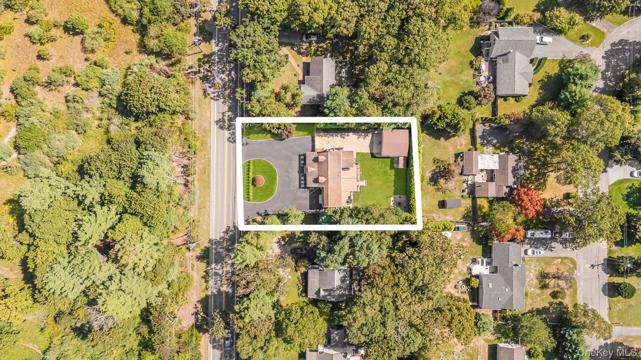 183 Old Country Road Speonk, NY 11972 - Photo 41 of 48 Aerial perspective of suburban area featuring property parcel outlined