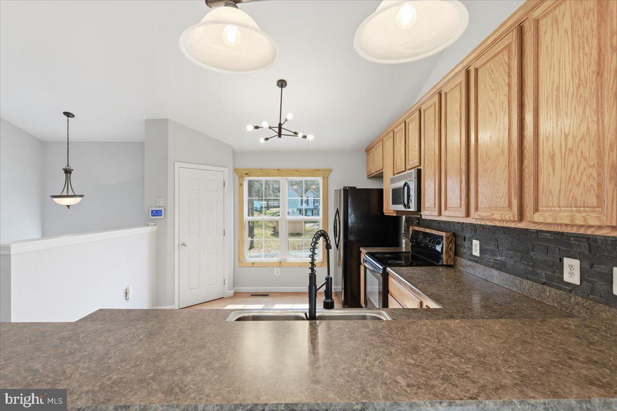 11585 Big Sandy Road Lusby, MD 20657 - Photo 11 of 48 a view of a livingroom with furniture