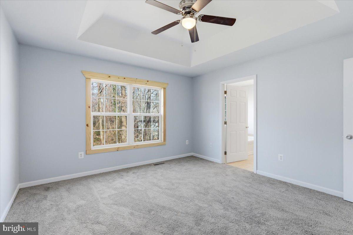 11585 Big Sandy Road Lusby, MD 20657 - Photo 19 of 48 a view of an empty room with a window
