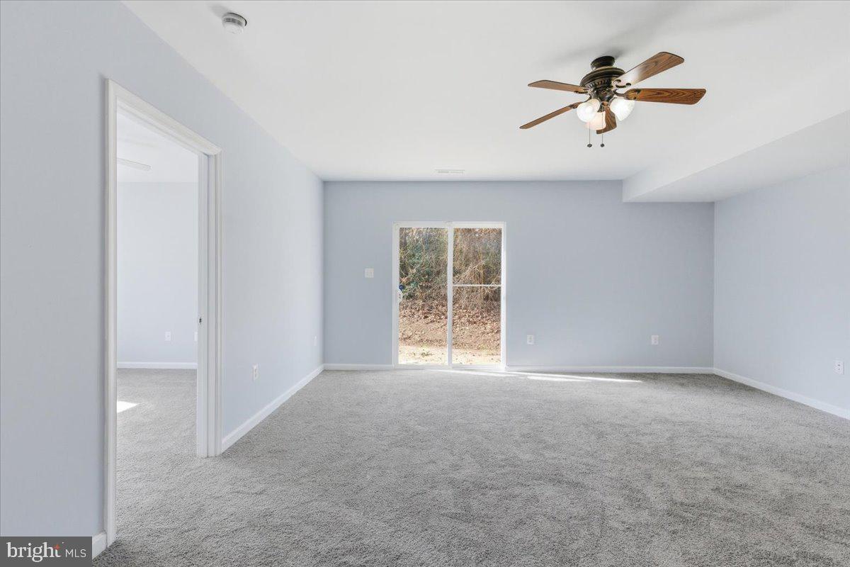 11585 Big Sandy Road Lusby, MD 20657 - Photo 33 of 48 a view of an empty room with a window