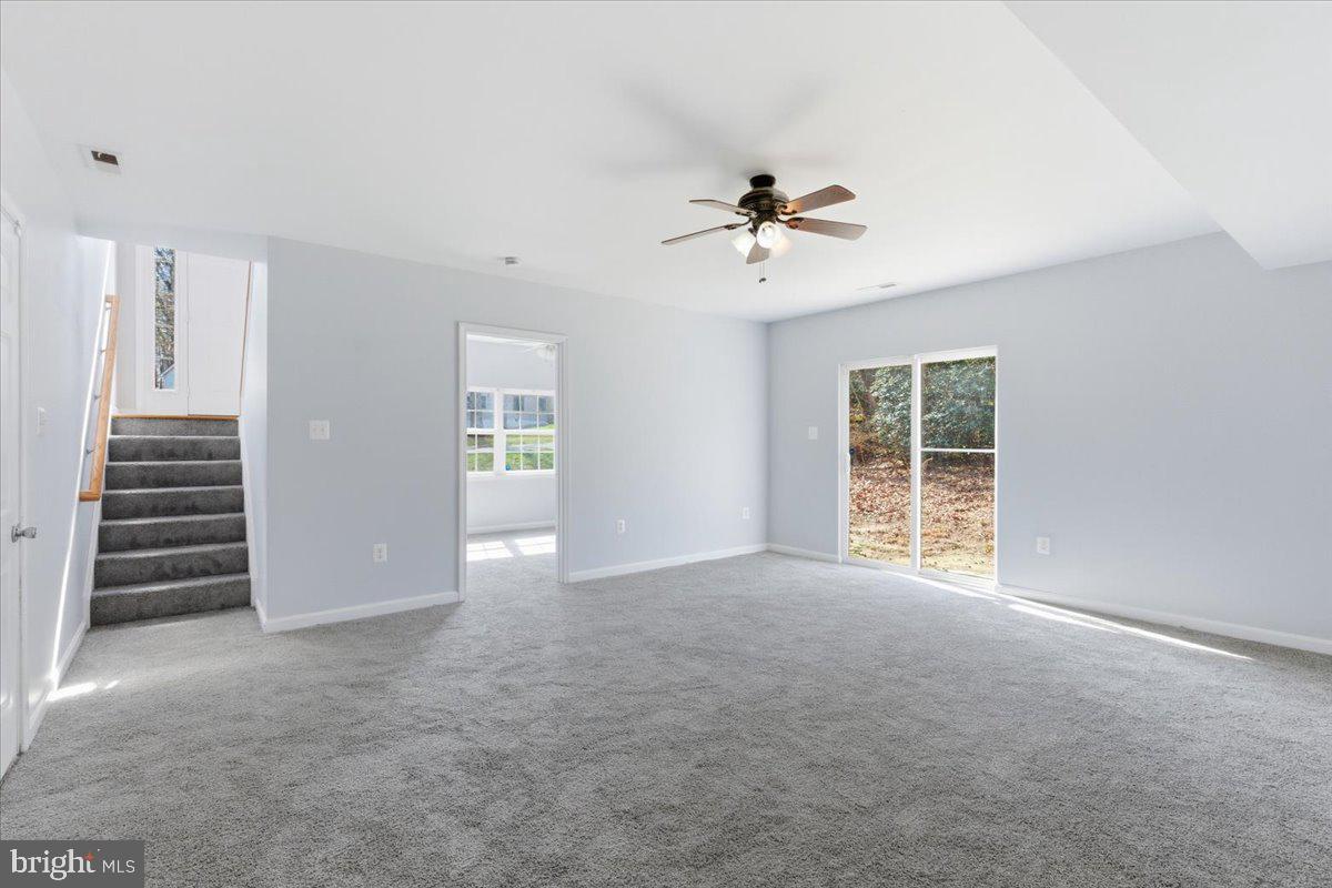 11585 Big Sandy Road Lusby, MD 20657 - Photo 34 of 48 a view of an empty room with a window