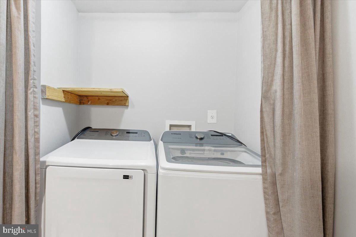 11585 Big Sandy Road Lusby, MD 20657 - Photo 41 of 48 a utility room with dryer and washer