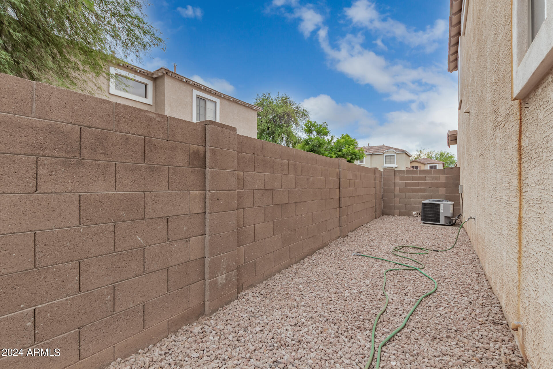 1371 South Boulder Street, Unit A Gilbert, AZ 85296 - Photo 42 of 43 a view of a backyard