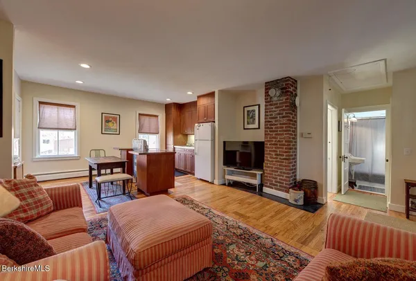 a bedroom with a bed and furniture