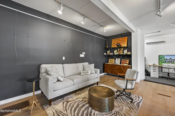 a living room with furniture and a couch