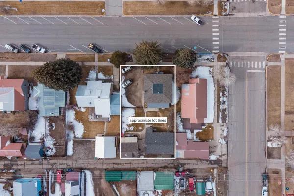an aerial view of houses with outdoor space