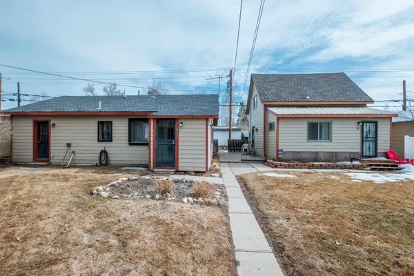 a front view of a house with a patio