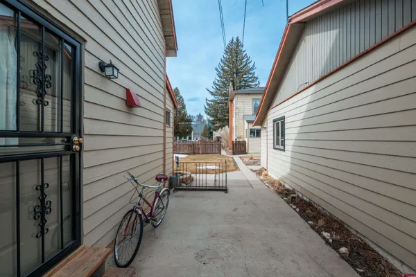 a view of a back yard of the house
