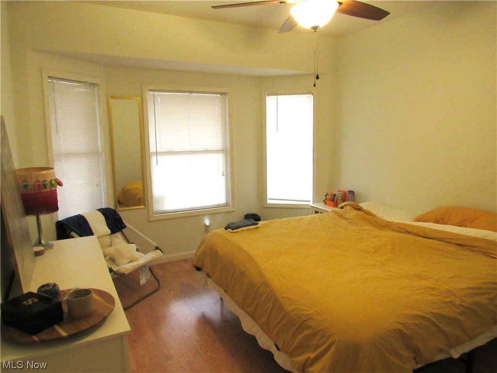 6311 Ridge Road Parma, OH 44129 - Photo 20 of 26 Bedroom with hardwood / wood-style floors and ceiling fan