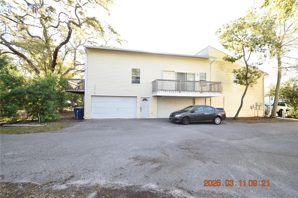 a view of car parked in front of house