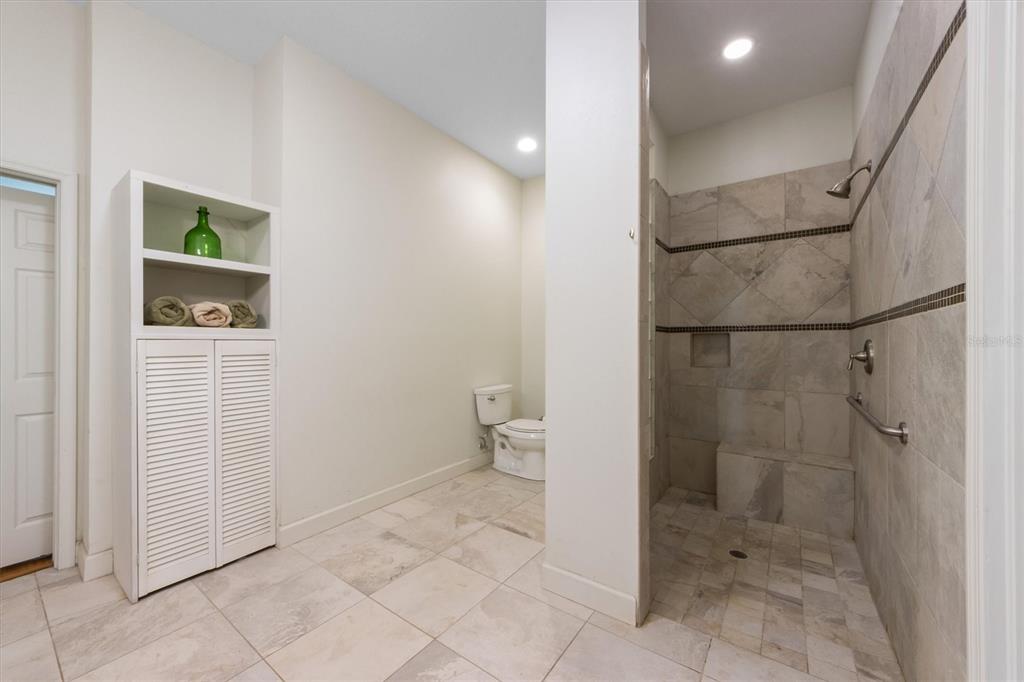 3310 Twin Rivers Trail Parrish, FL 34219 - Photo 23 of 42 a bathroom with a shower and toilet