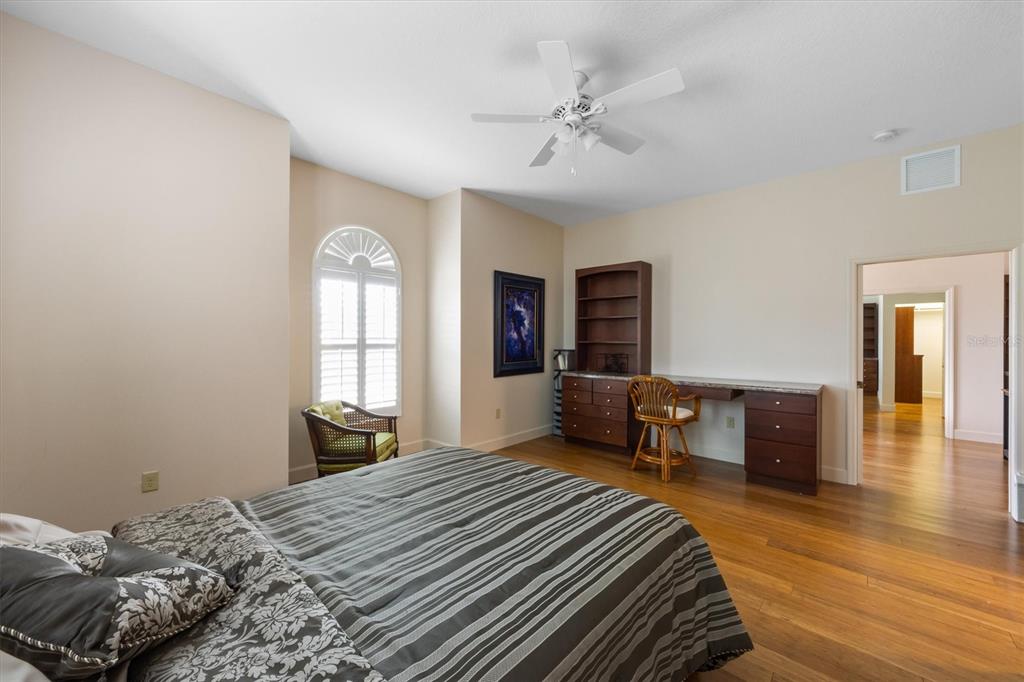 3310 Twin Rivers Trail Parrish, FL 34219 - Photo 27 of 42 a bedroom with a large bed and a window