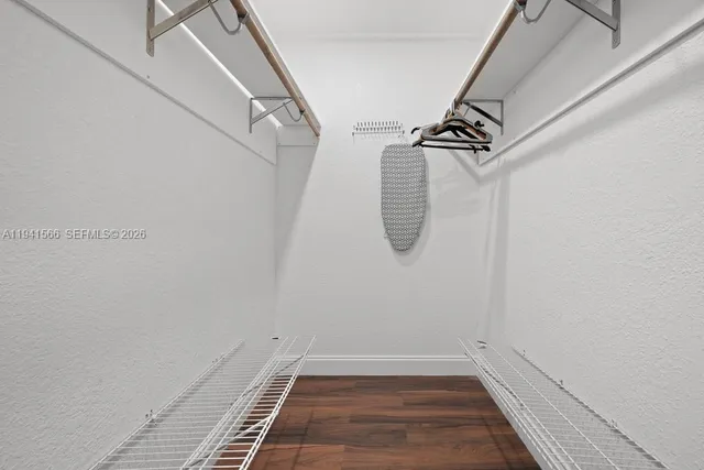 a view of a room with racks on the wall