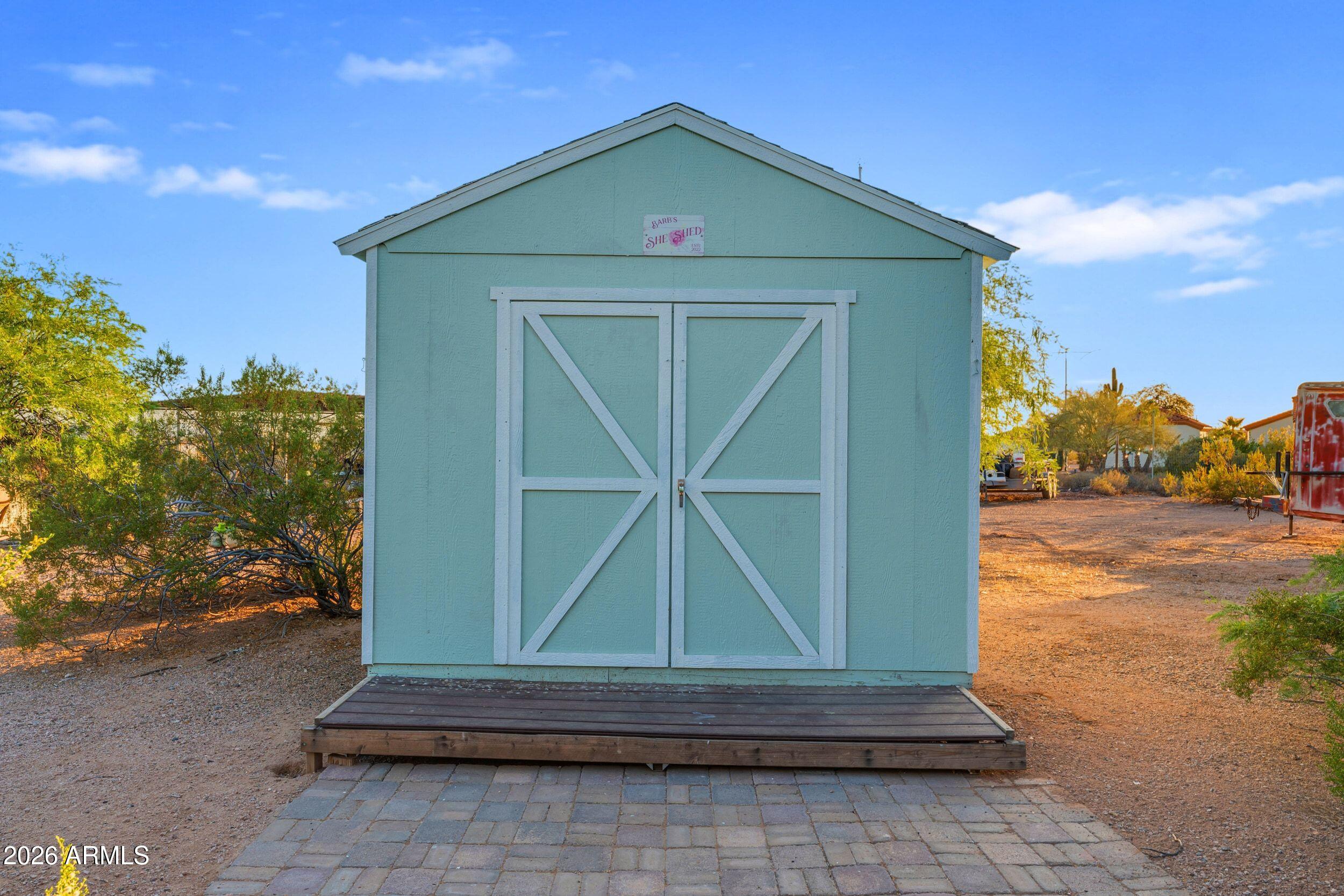 4284 North Colt Road Apache Junction, AZ 85119 - Photo 73 of 92 a front view of a house with a yard