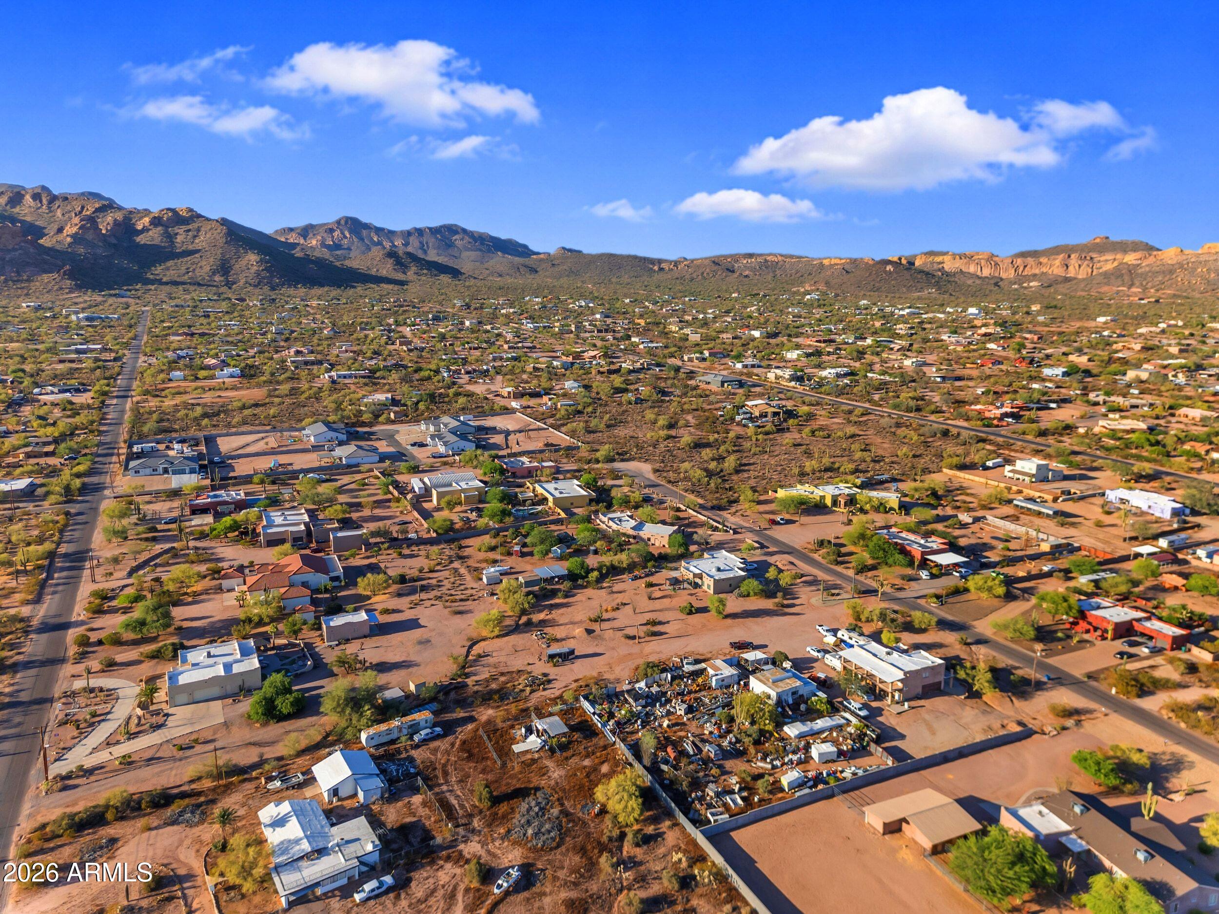 4284 North Colt Road Apache Junction, AZ 85119 - Photo 89 of 92 an aerial view of residential houses with outdoor space and trees
