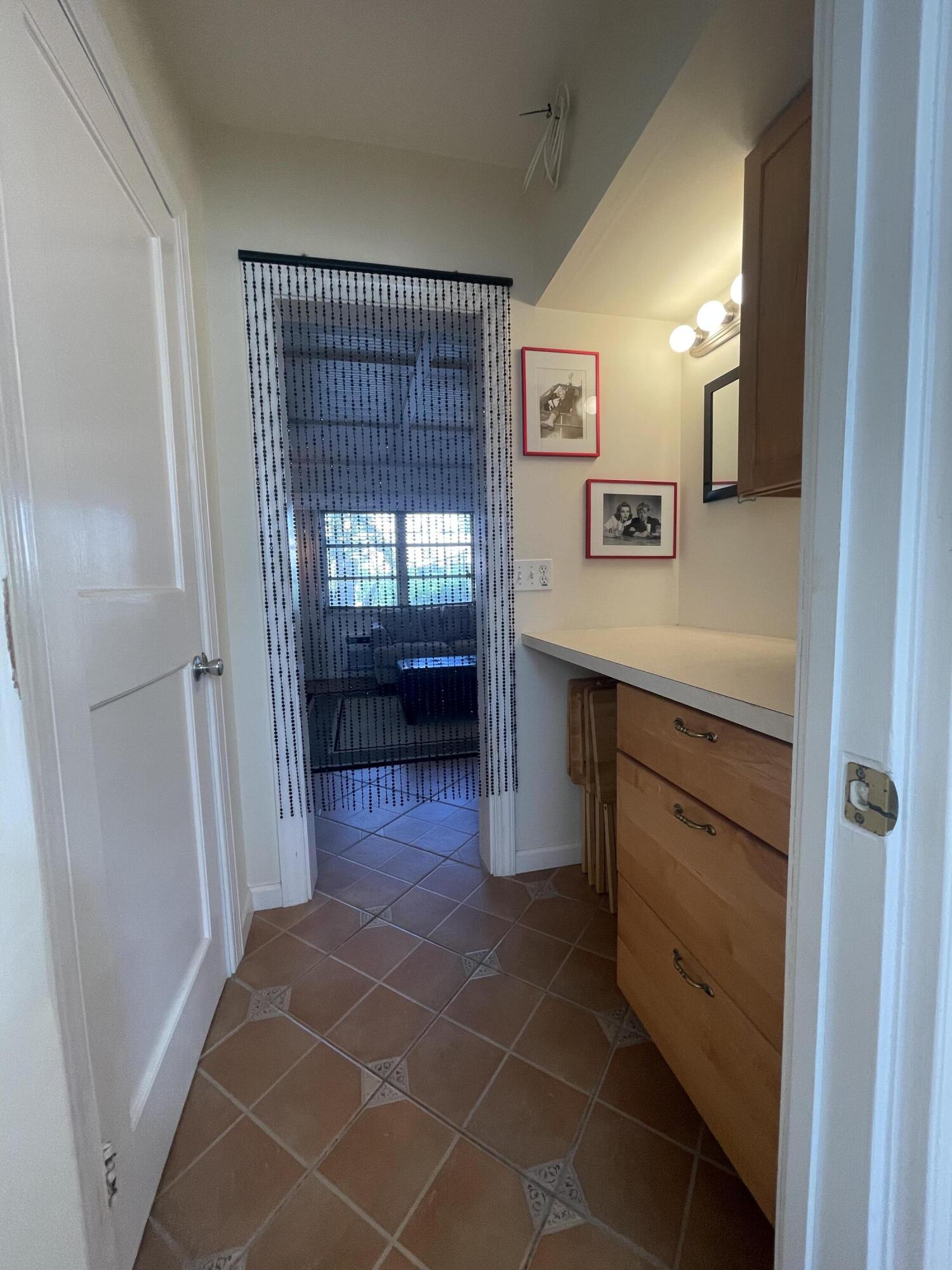 101 South Golfview Road, Unit 5 Lake Worth Beach, FL 33460 - Photo 15 of 30 Powder Room Area with Closet