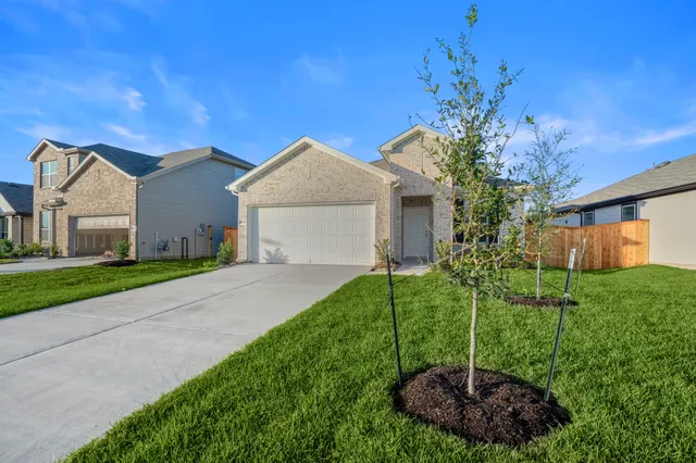 a house view with a garden space
