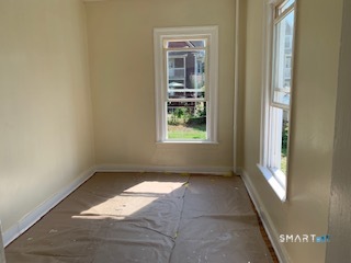 426 Union Avenue, Unit 2 Bridgeport, CT 06607 - Photo 5 of 19 an empty room with windows