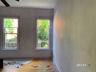 426 Union Avenue, Unit 2 Bridgeport, CT 06607 - Photo 7 of 19 a view of an empty room and window