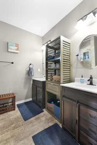 a bathroom with a sink and a mirror