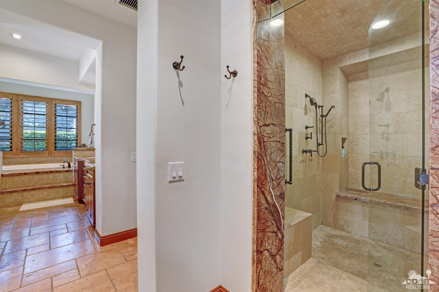 41 Cassis Circle Rancho Mirage, CA 92270 - Photo 26 of 68 a bathroom with a shower