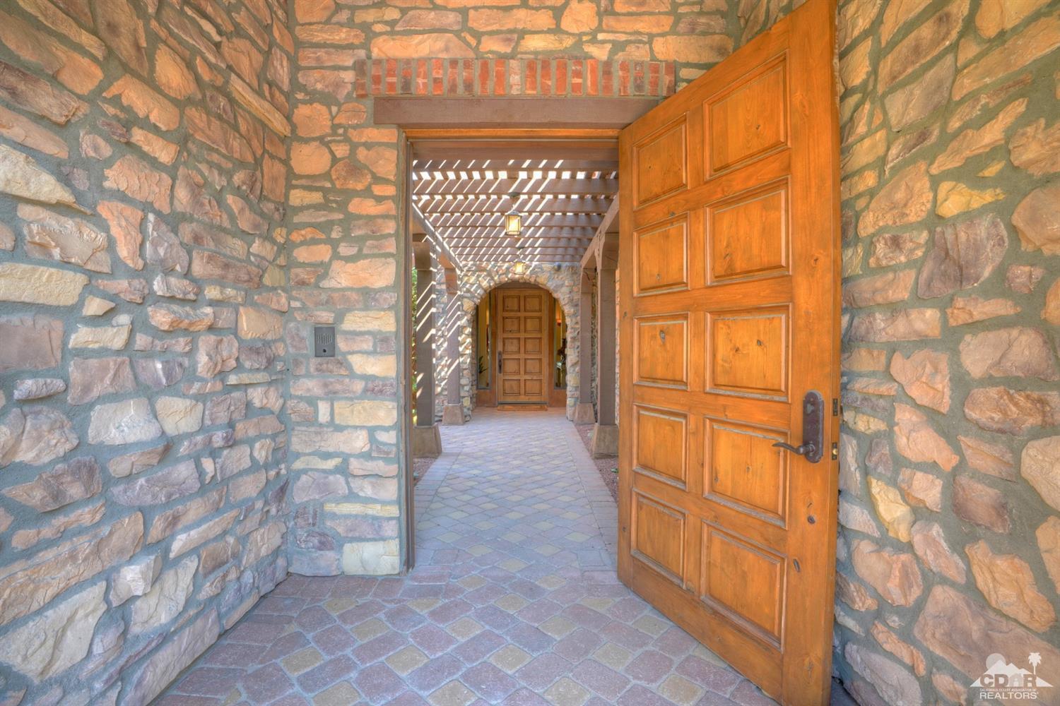 41 Cassis Circle Rancho Mirage, CA 92270 - Photo 4 of 68 a view of entryway with wooden walls