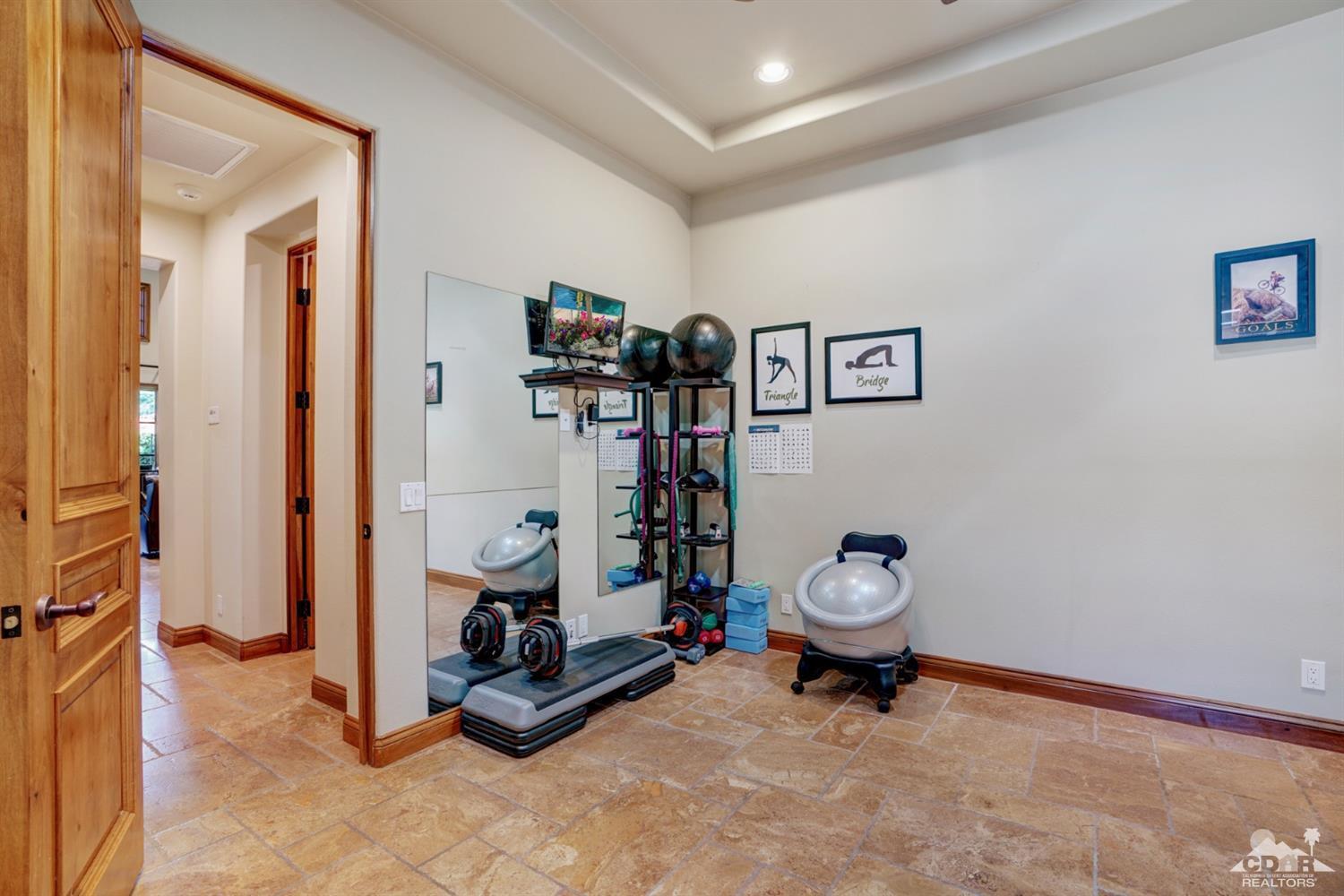 41 Cassis Circle Rancho Mirage, CA 92270 - Photo 33 of 68 a view of a hallway with workspace