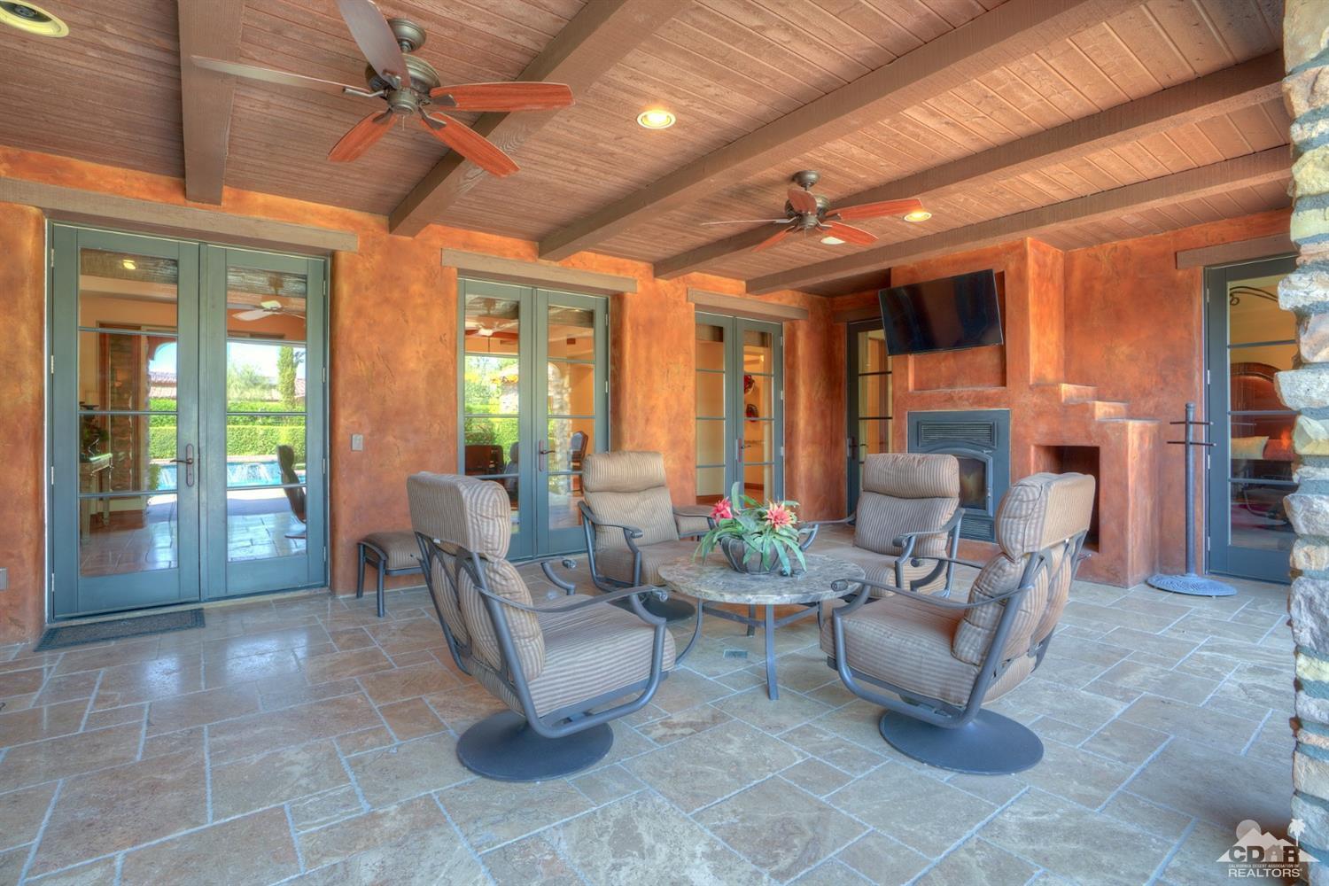 41 Cassis Circle Rancho Mirage, CA 92270 - Photo 35 of 68 a lobby with furniture and floor to ceiling window